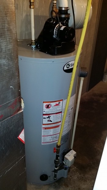 Power vent hot water heater installation