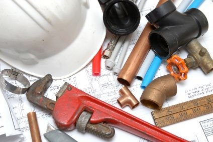 Plumbing parts, tools, and plans used by Drain King Plumbing And Drain Services LLC.